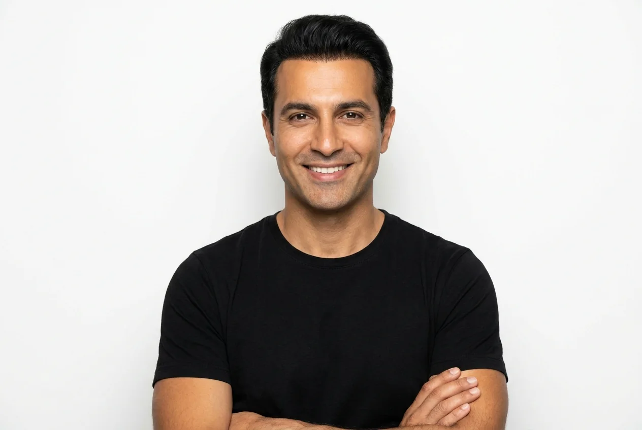 A man with a full head of hair and a natural front hairline