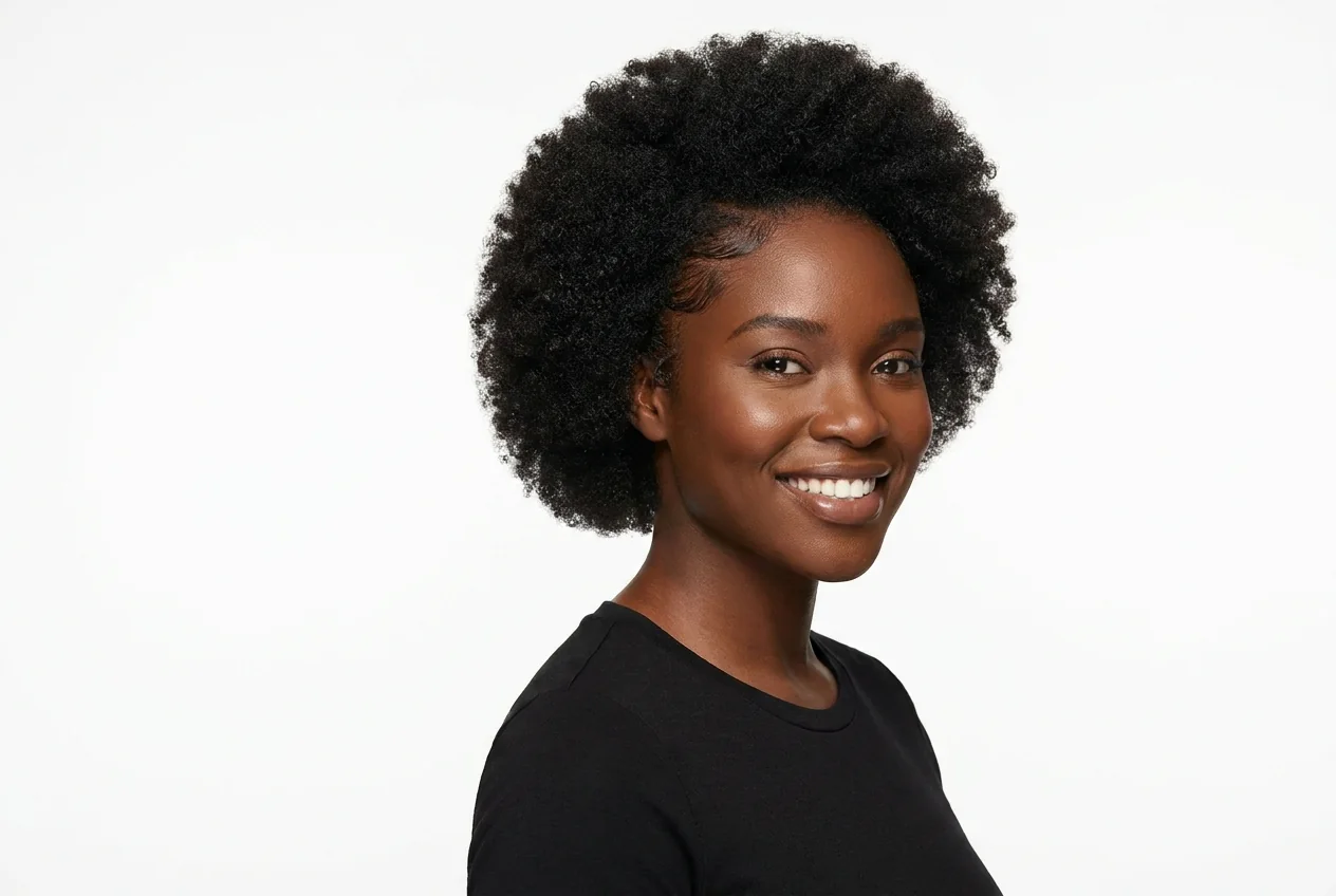 A woman with dense afro-textured hair and strong edges