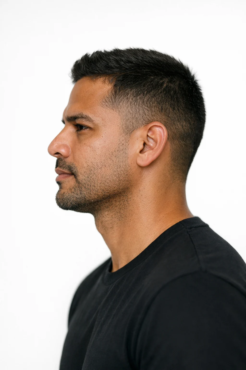 A model photographed in profile, chin and jaw in frame