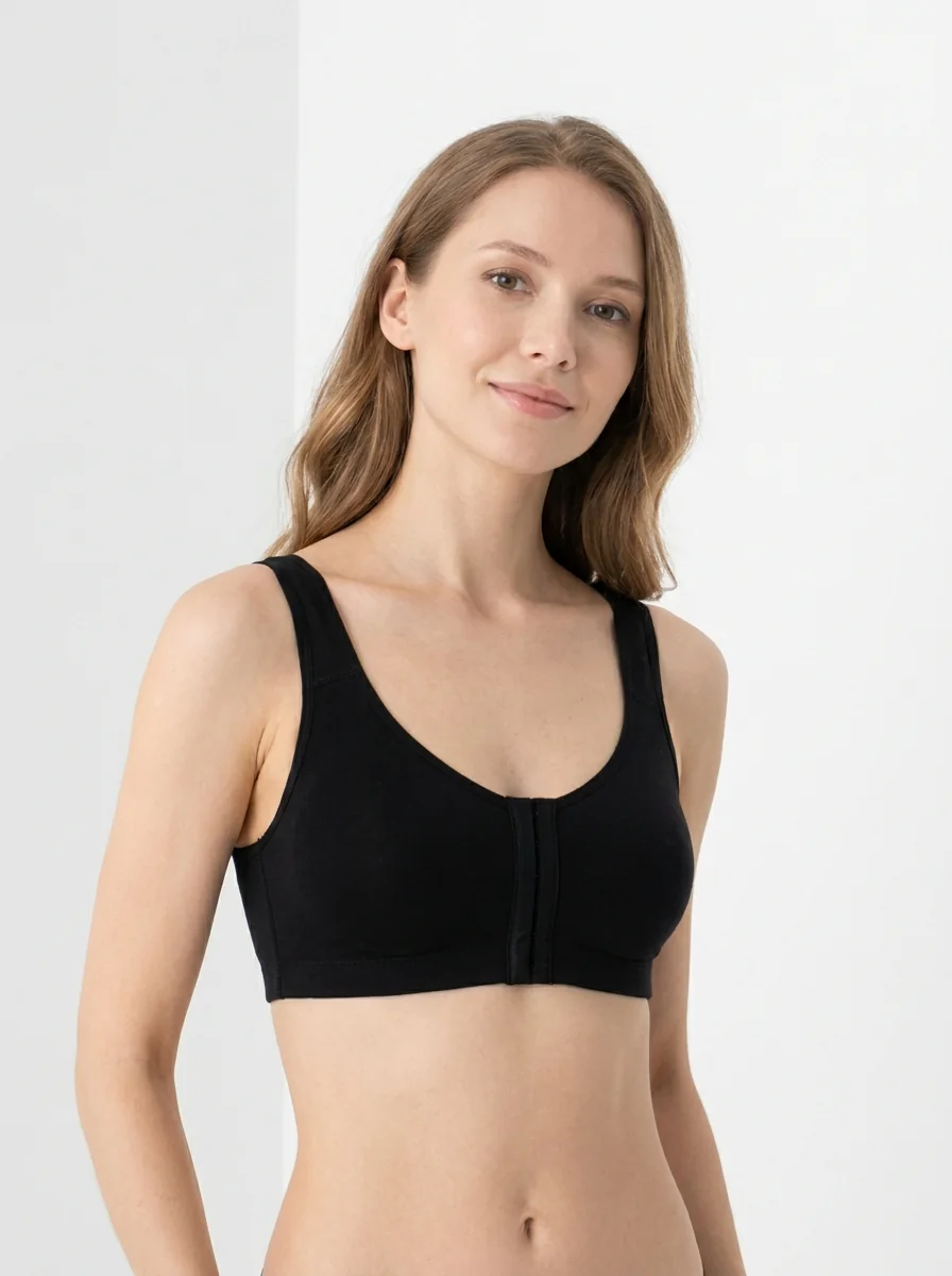 A model in a post-surgical compression bra, photographed for Goals